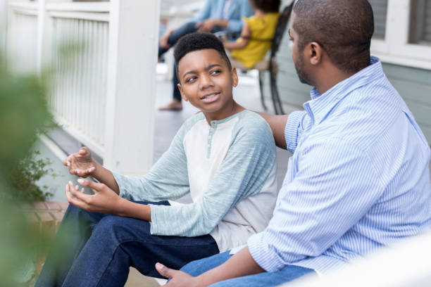 istock Preteen son enjoys quality time with father 927892152