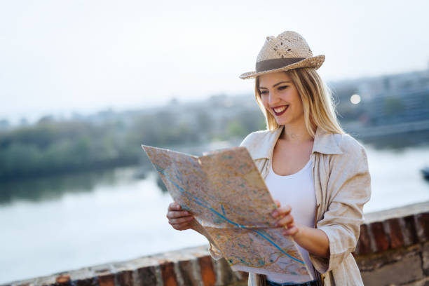 istock Happy blond female traveling and sightseeing 927893540