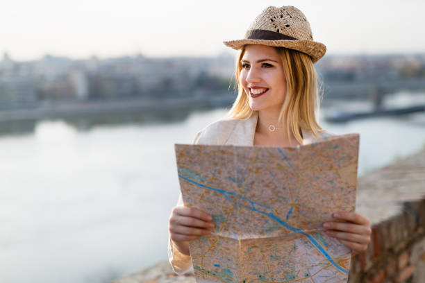 istock Happy blond female traveling and sightseeing 927893612
