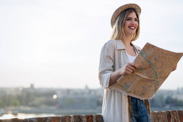 istock Happy female tourist sightseeing and exploring 927893758