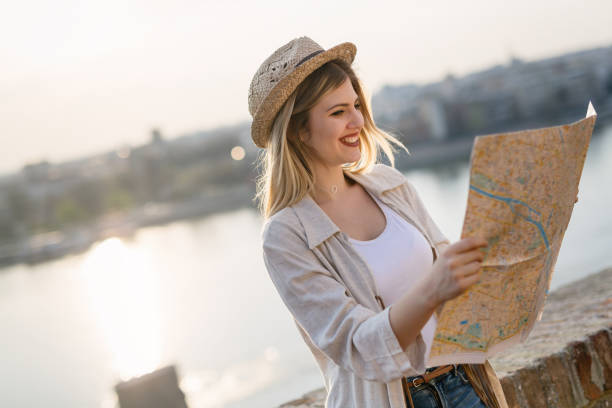 istock Happy female tourist sightseeing and exploring 927893780