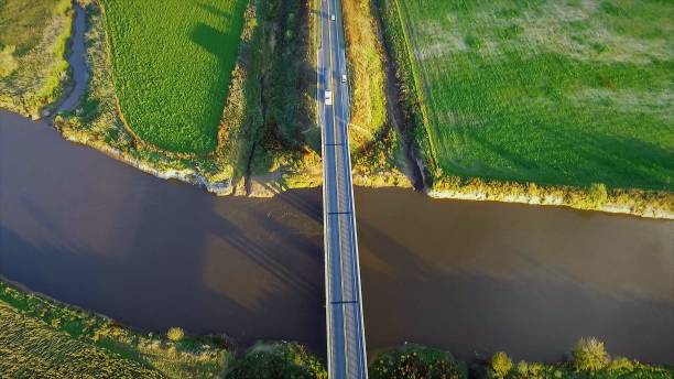 istock river, bridge, agriculture, aerial view, drone 927901886
