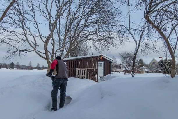 istock Shoveling snow in garden 927902982
