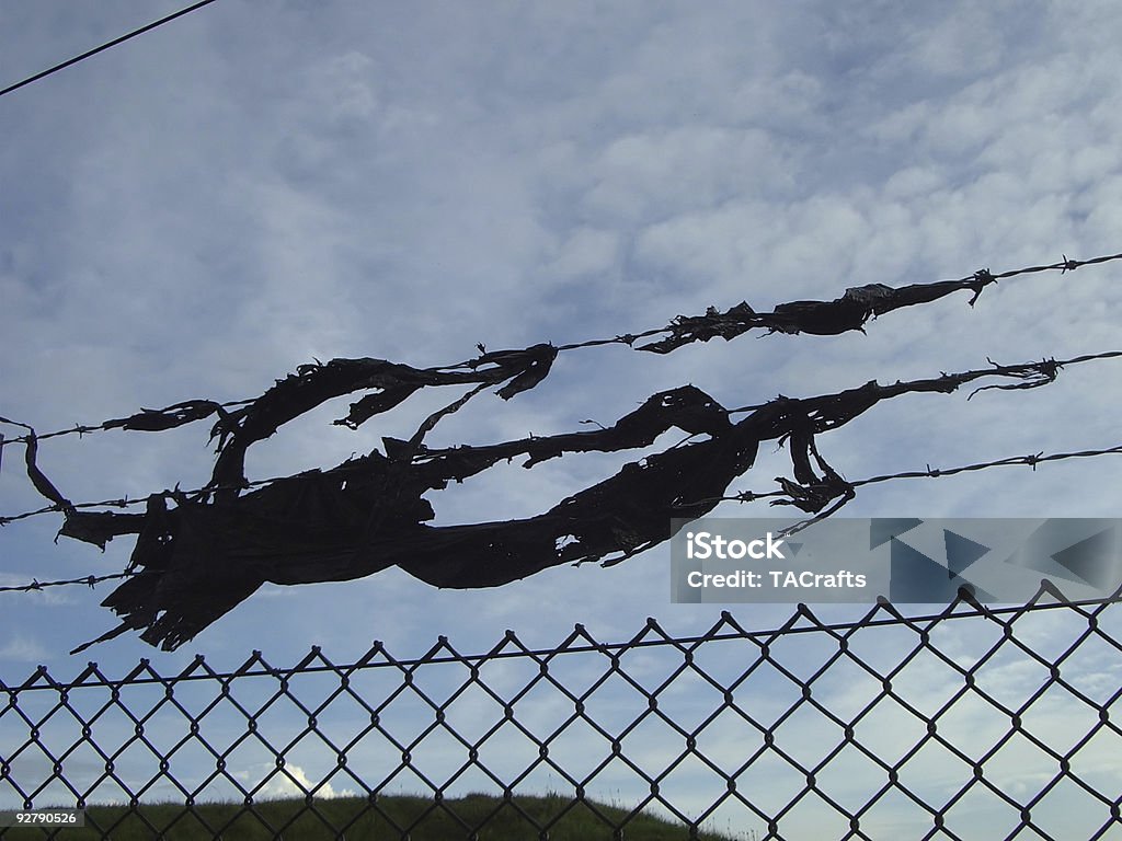 Le fil de fer - Photo de Agent de sécurité libre de droits