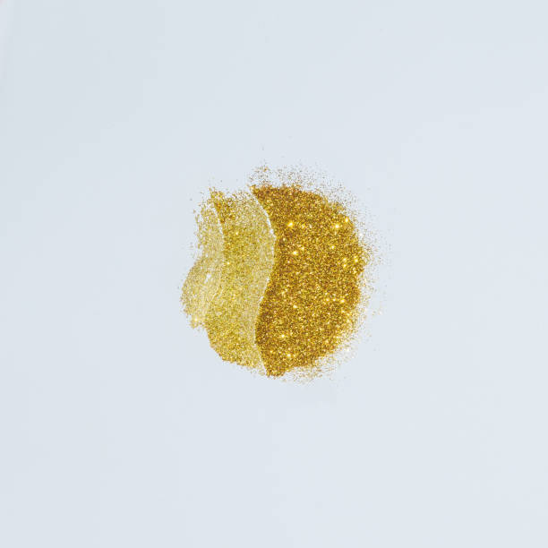 istock Coffee bean made of gold glitter paint. Minimal creative concept. Flat lay. 927908770