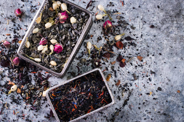 istock Virious kinds of tea on gray table healthy drink concept 927908790