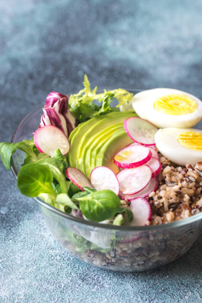 istock Bowl of wild rice with avocado, egg and lettuce 927911596