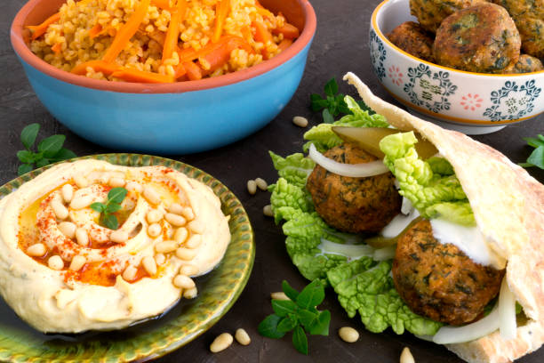 istock Eastern food, hummus, bulgur wheat and falafel. 927916224