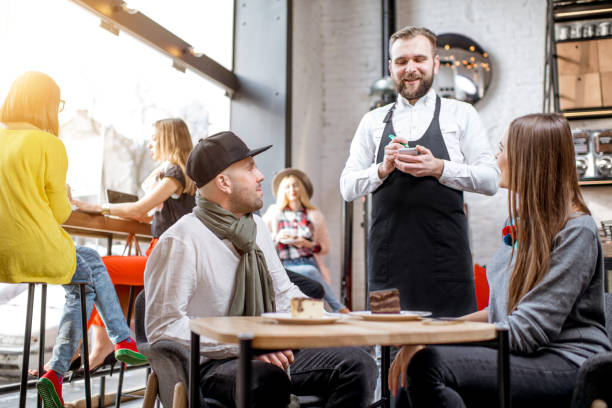 istock Couple ordering in the cafe 927916276