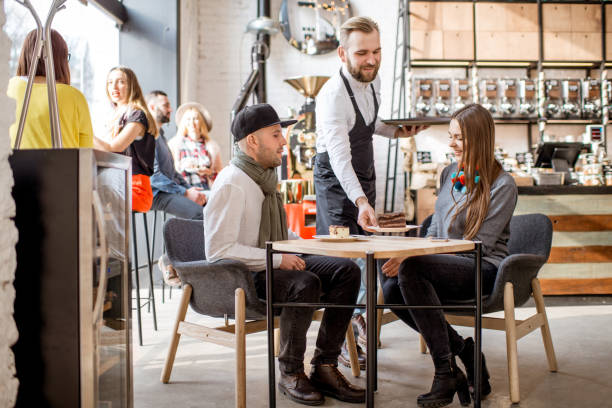 Couple ordering in the cafe