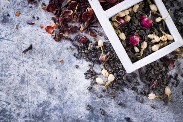 istock Virious kinds of tea on gray table healthy drink concept 927916326