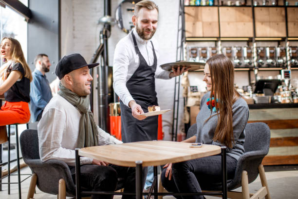 istock Couple ordering in the cafe 927916354