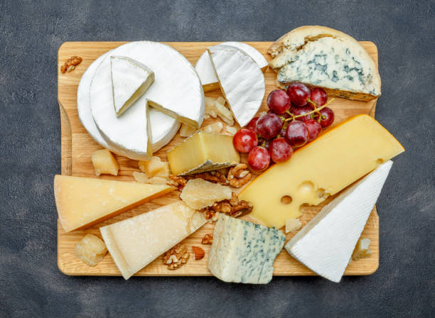 istock Various types of cheese - parmesan, brie, roquefort, cheddar 927924316