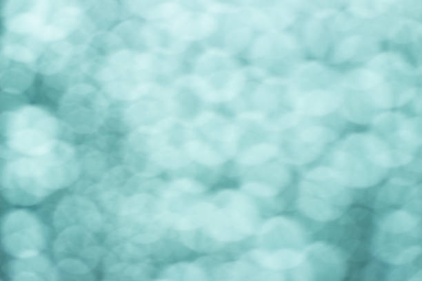 istock Abstract blurred bokeh background from water drops 927924590