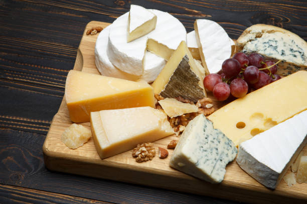 istock Various types of cheese - parmesan, brie, roquefort, cheddar 927925008