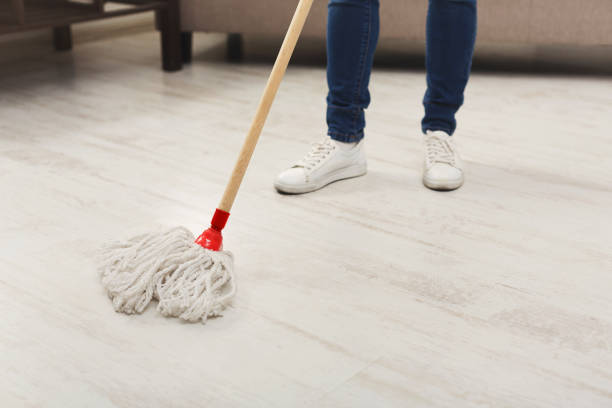 istock Unrecognizable woman with mop ready to clean floor 927930318