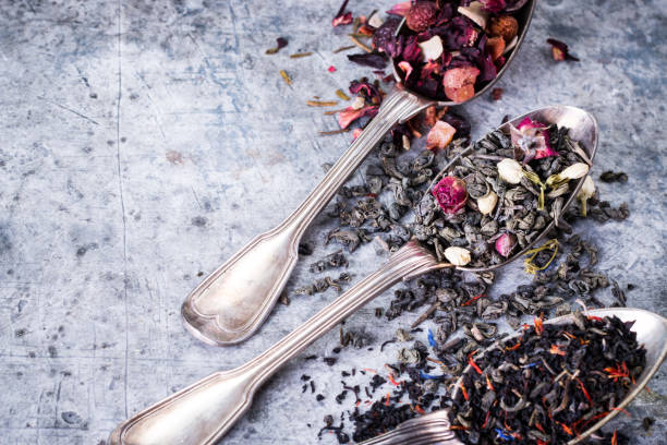 istock Virious kinds of tea on gray table healthy drink concept 927940286