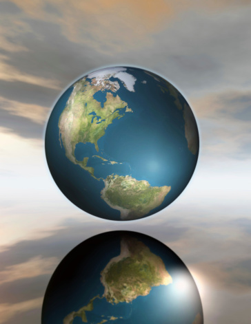 Three isolated minimalist globes from different angles. 3D render