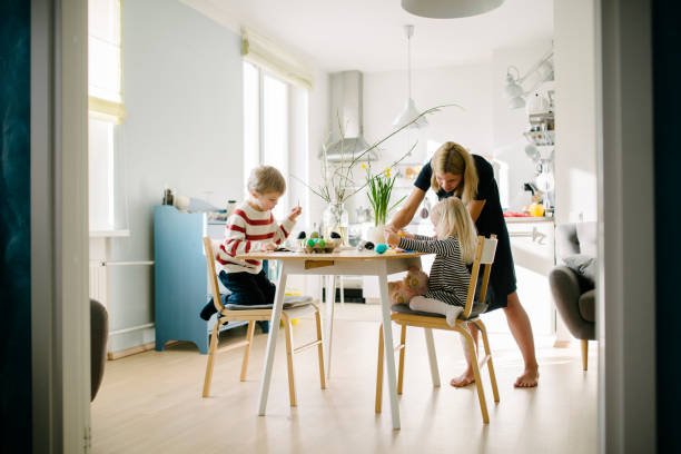 istock Nordic family during an Easter preparation 927960304