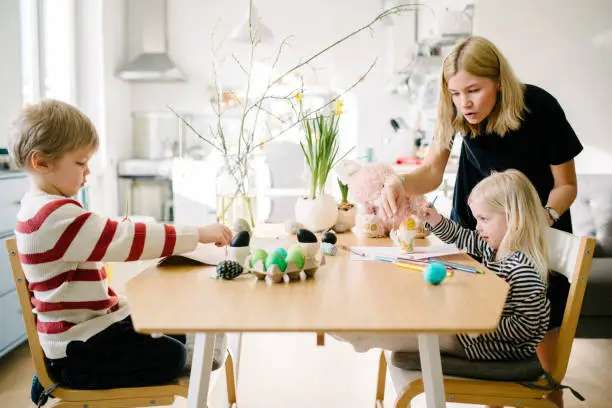 Photo of Nordic family during an Easter preparation