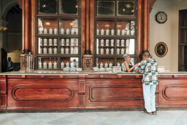 Havana, Cuba - March 18, 2015: Local people in a traditional old Pharmacy in Havana, Cuba