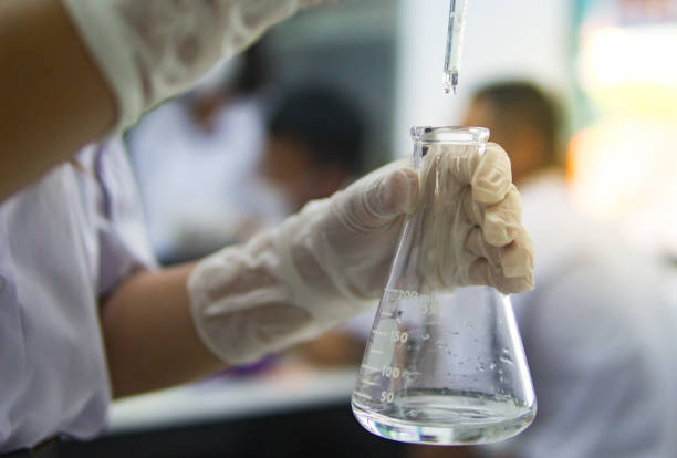 istock Chemical laboratory test in science education classroom is acid base titration 927974966