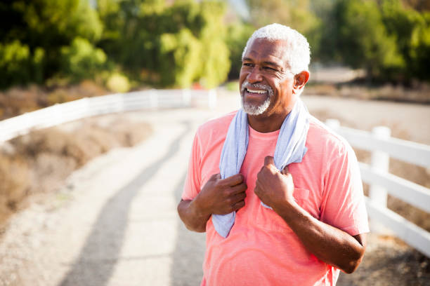 senior black man after workout - senior adult relaxation exercise healthy lifestyle exercising imagens e fotografias de stock