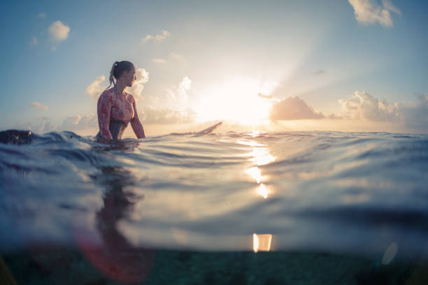 istock Young lady surfer waits the waves 927982940