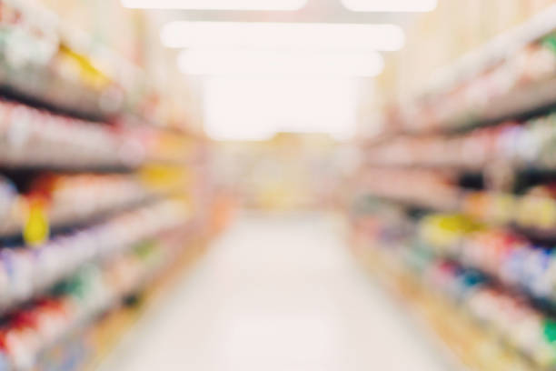 istock Blurred background - Store of shopping mall blur background with bokeh. 927983036