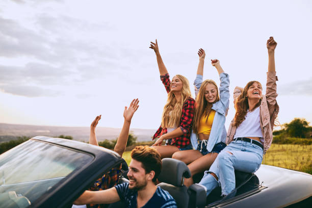 istock Friends riding in the car. 927987118