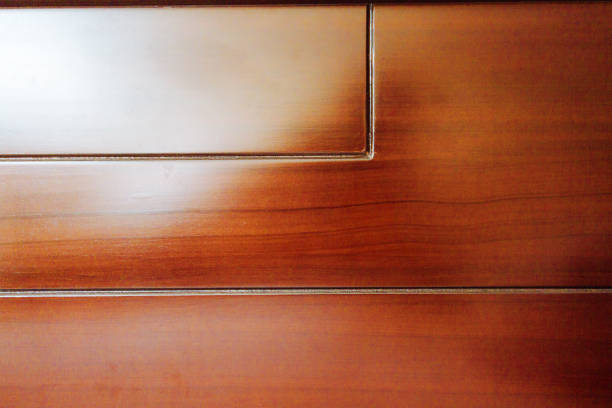 Close-up of polished wooden bed backrest