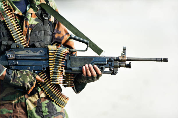 istock soldier carrying  big gun  in combat training 927994160