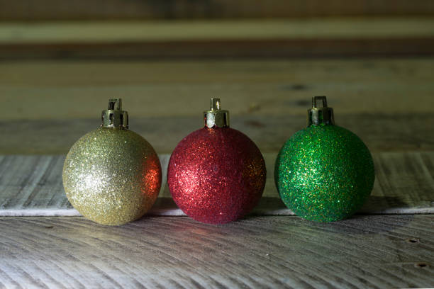 istock Christmas ball on wooden background 927995268