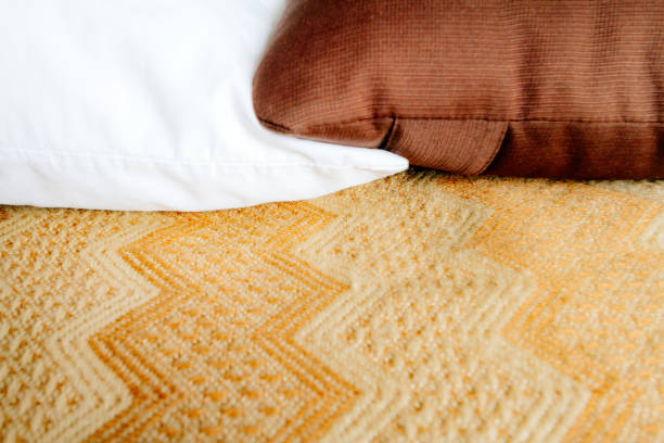istock Macro close-up of a pillow and cushion with Peruvian design blanket 927998004