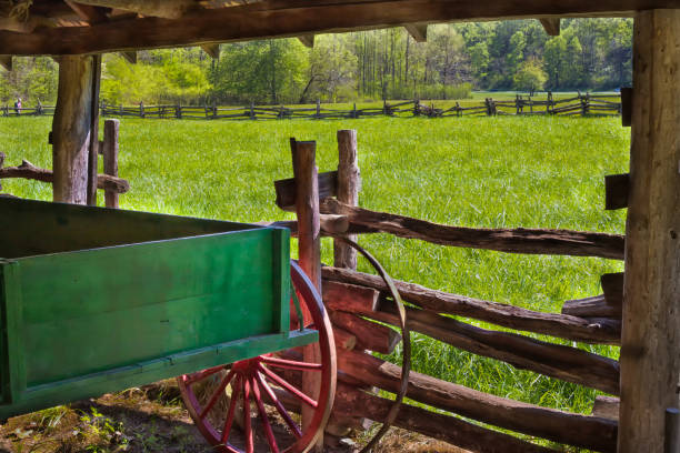 istock Antique wooden wagon parked in the barn 927998316