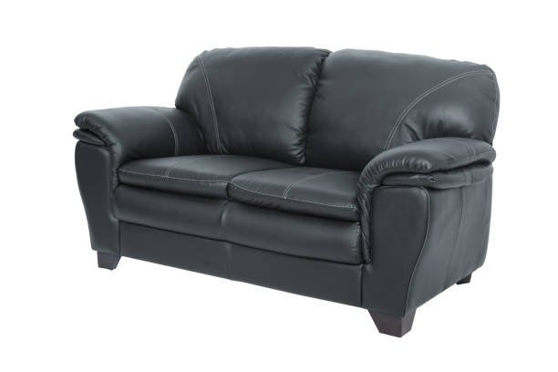 istock Two seats cozy black leather sofa isolated on white background 928001966