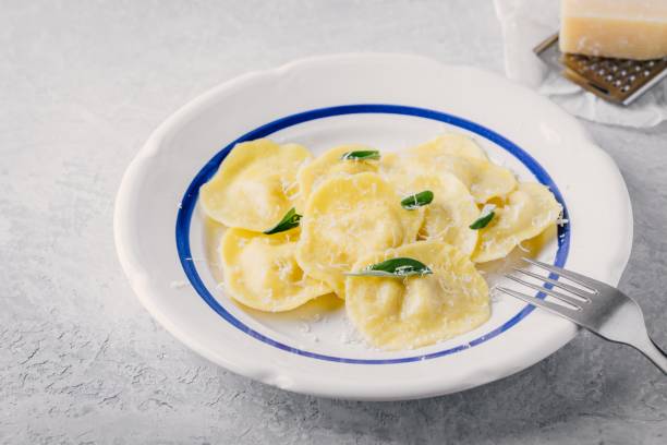 istock ravioli pasta with parmesan cheese and sage 928002404