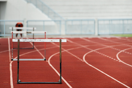 Row of hurdles for a track and field sprint hurdle race.