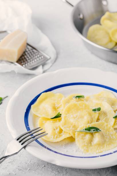 istock ravioli pasta with parmesan cheese and sage 928002494