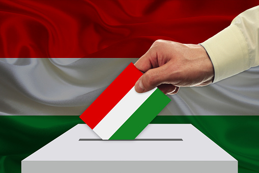 Ballot box with national flag on background - Hungary