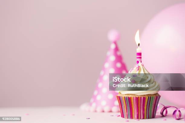 Birthday Cupcake With Candle Stock Photo - Download Image Now - Birthday, Balloon, Pink Color