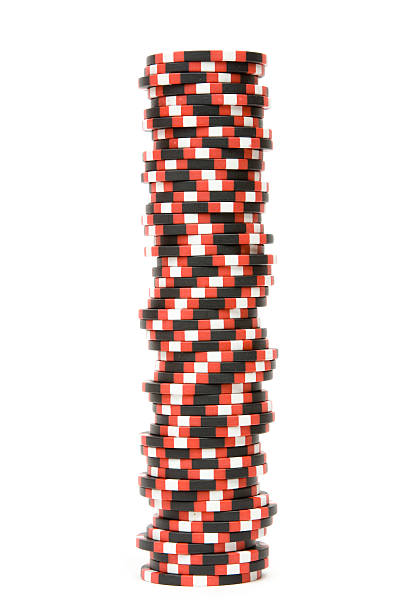 Stack of casino chips isolated over white background stock photo