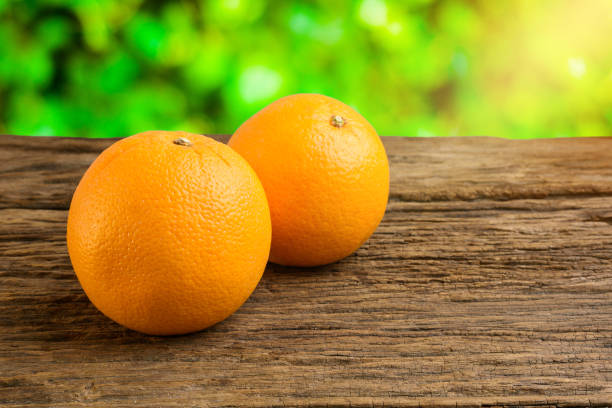 istock Still Life Fresh Orange Fruit on Vintage grunge Wooden Table 928009270