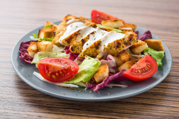 istock Fresh salad with roast chicken fillet and vegetables 928012894