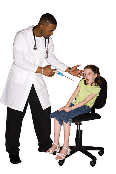 Doctor Giving Shot stock photo