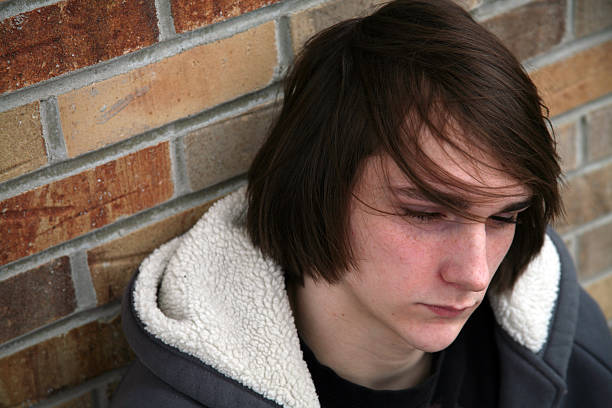 Down in the Dumps  emo boy stock pictures, royalty-free photos & images