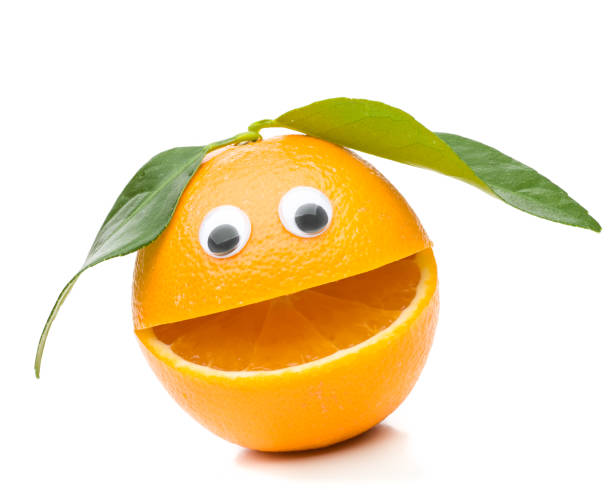 istock One laughing orange with leaves as hair 928023874