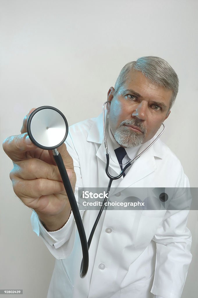 Médico e Estetoscópio durante um exame - Foto de stock de Branco royalty-free