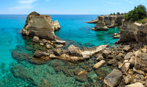 istock Faraglioni at Torre Sant Andrea, Italy 928024792