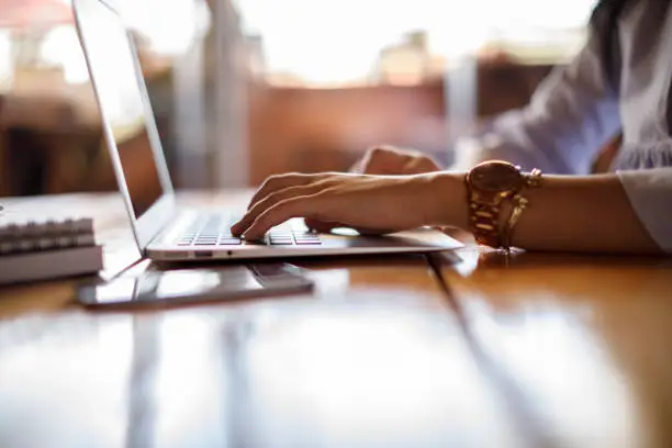 Photo of Female student checking her computer